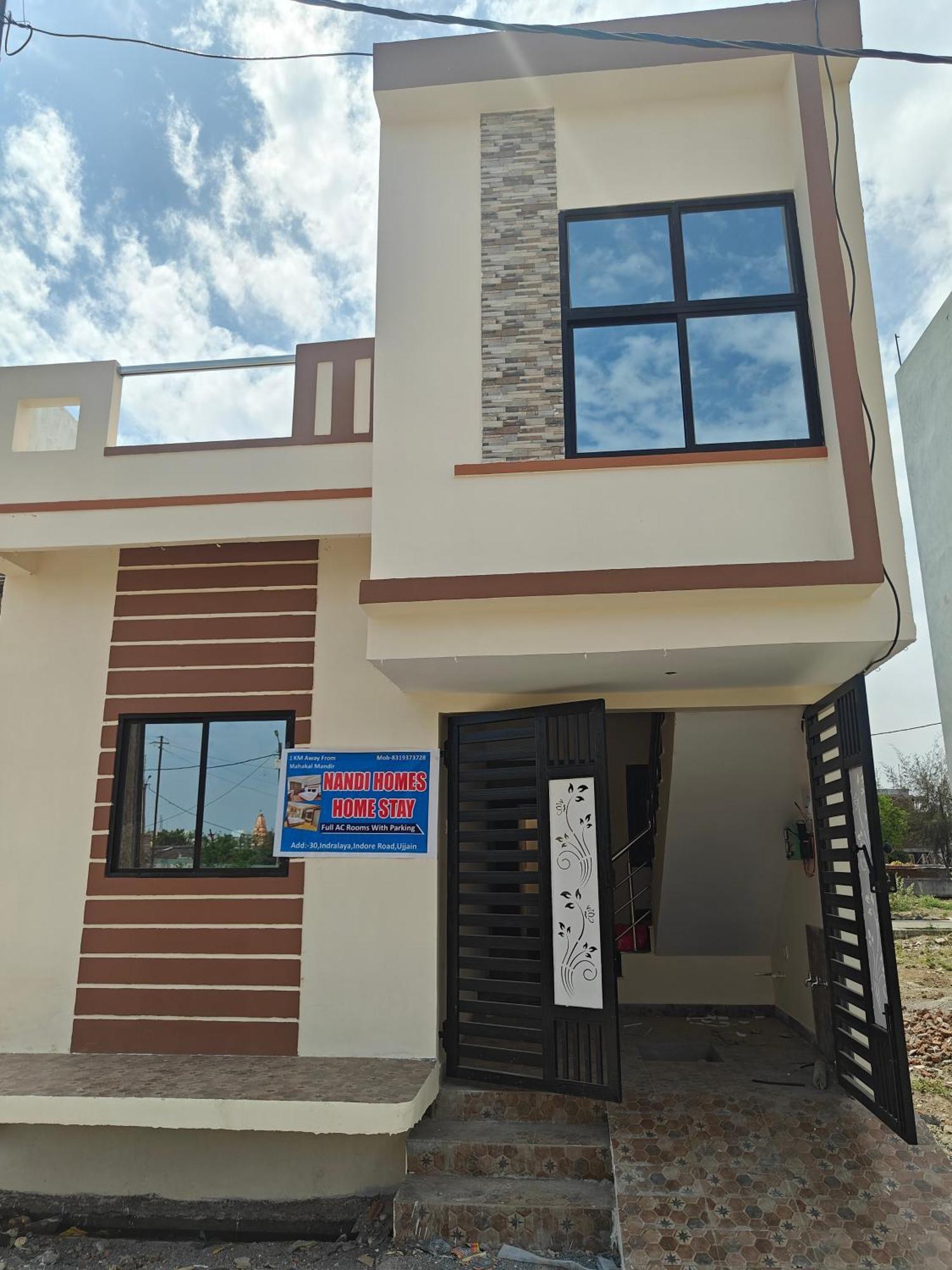 Nandi Homes Homestay Ujjain Esterno foto